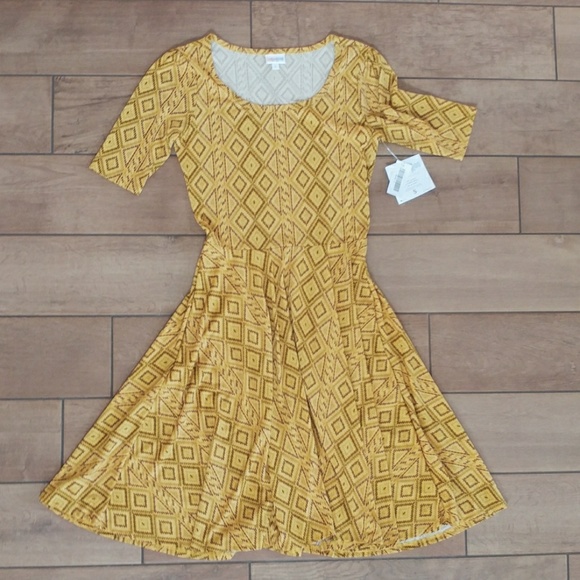 LuLaRoe Dresses & Skirts - Lularoe yellow patterned Nicole dress size small LuLaRoe Dresses & Skirts - Lularoe yellow patterned Nicole dress size small